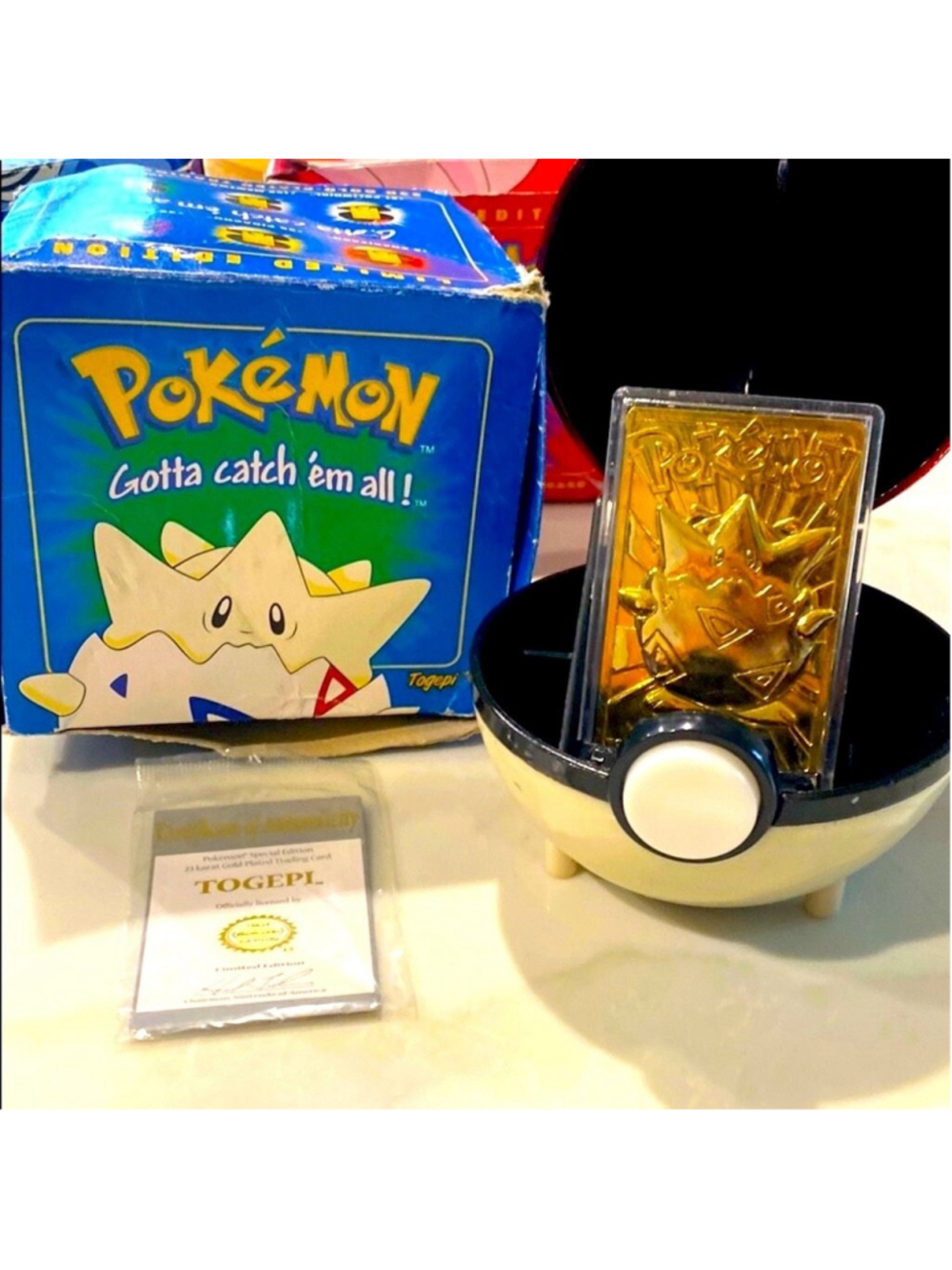Togepi 23k gold plated card with a Pokeball case. Perfect for Pokemon fans.